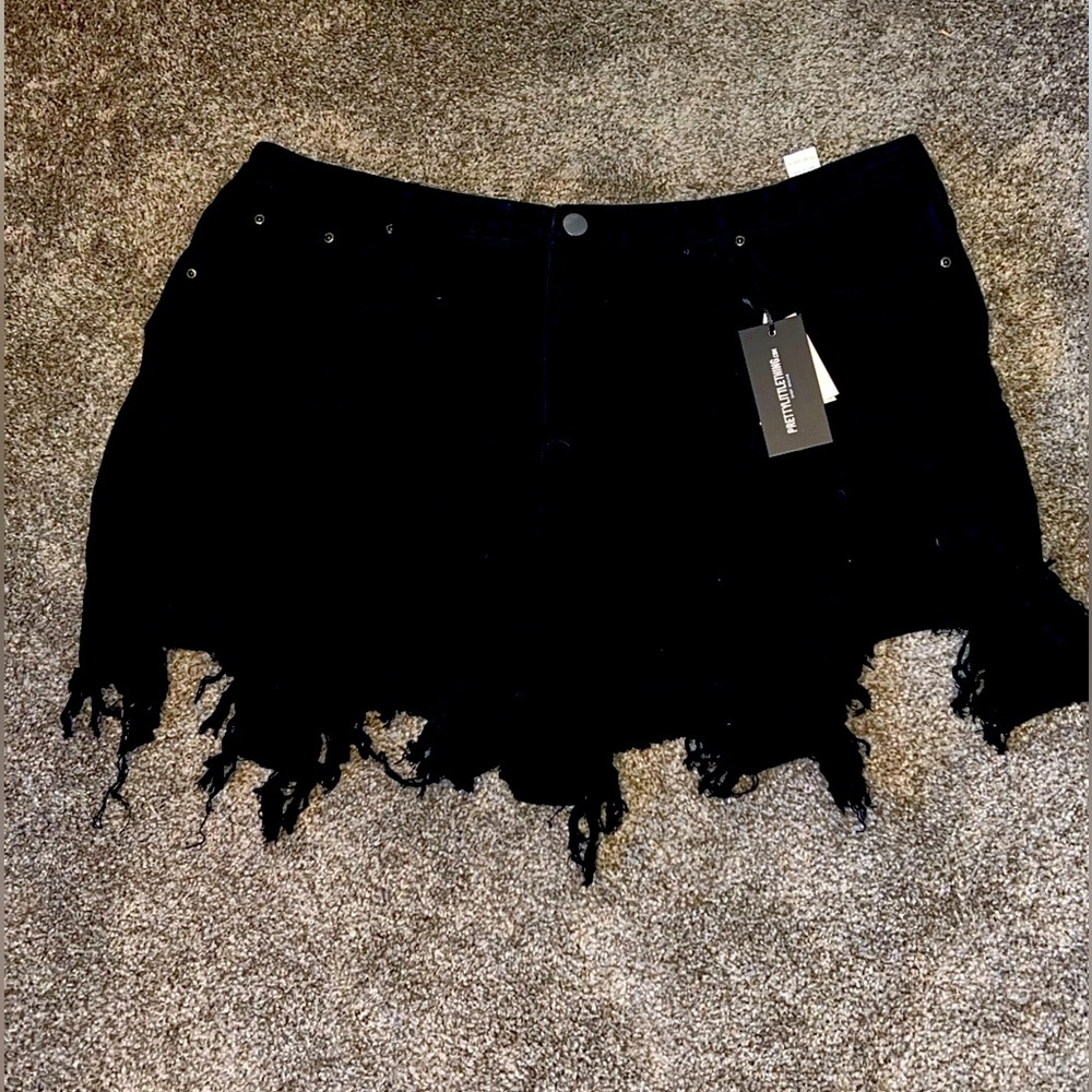 Pretty Little Thing ripped black denim shorts. 22. Never worn.